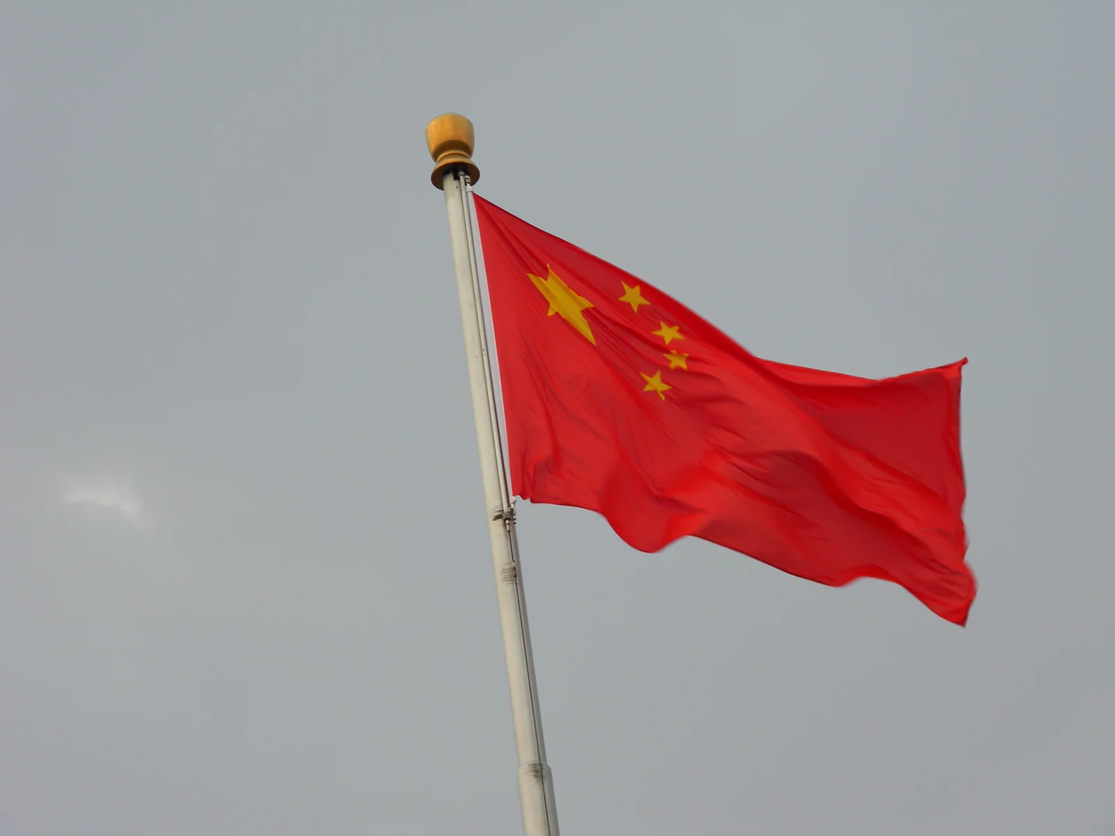 A Chinese national flag flying from a pole, photographed on June 17, 2012.