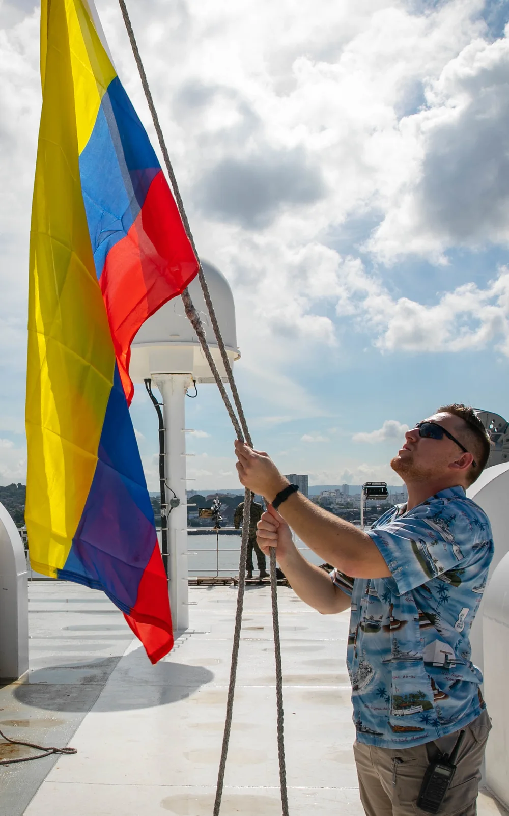 A Colombian flag is raised aboard USNS Comfort as the ship arrives in Cartagena on November 11, 2022.