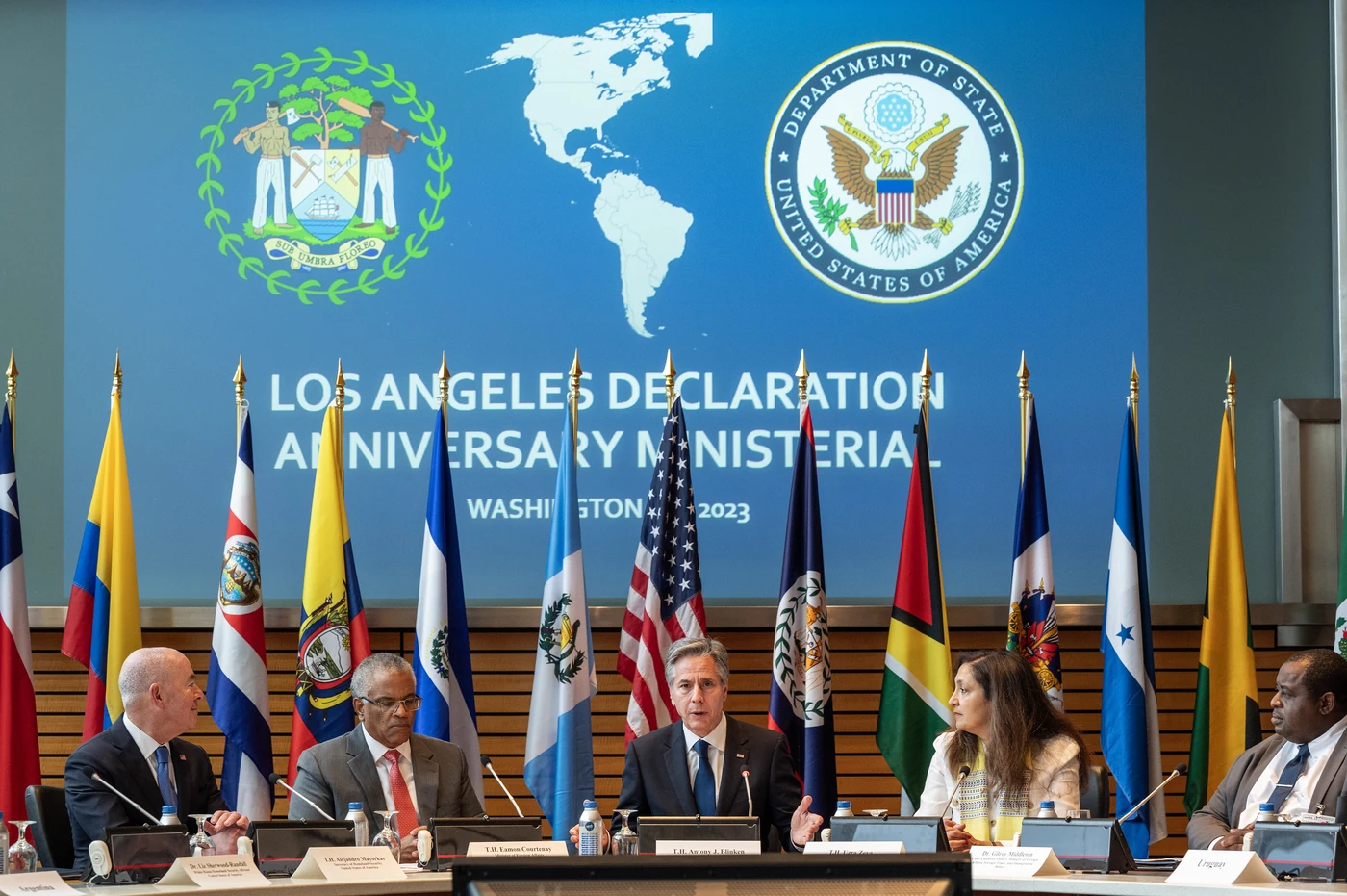 A Guatemala flag appears among national flags at the Los Angeles Declaration Anniversary Ministerial in Washington, D.C., on June 23, 2023. The State Department identifies the event as co-hosted by Antony Blinken and Alejandro Mayorkas.